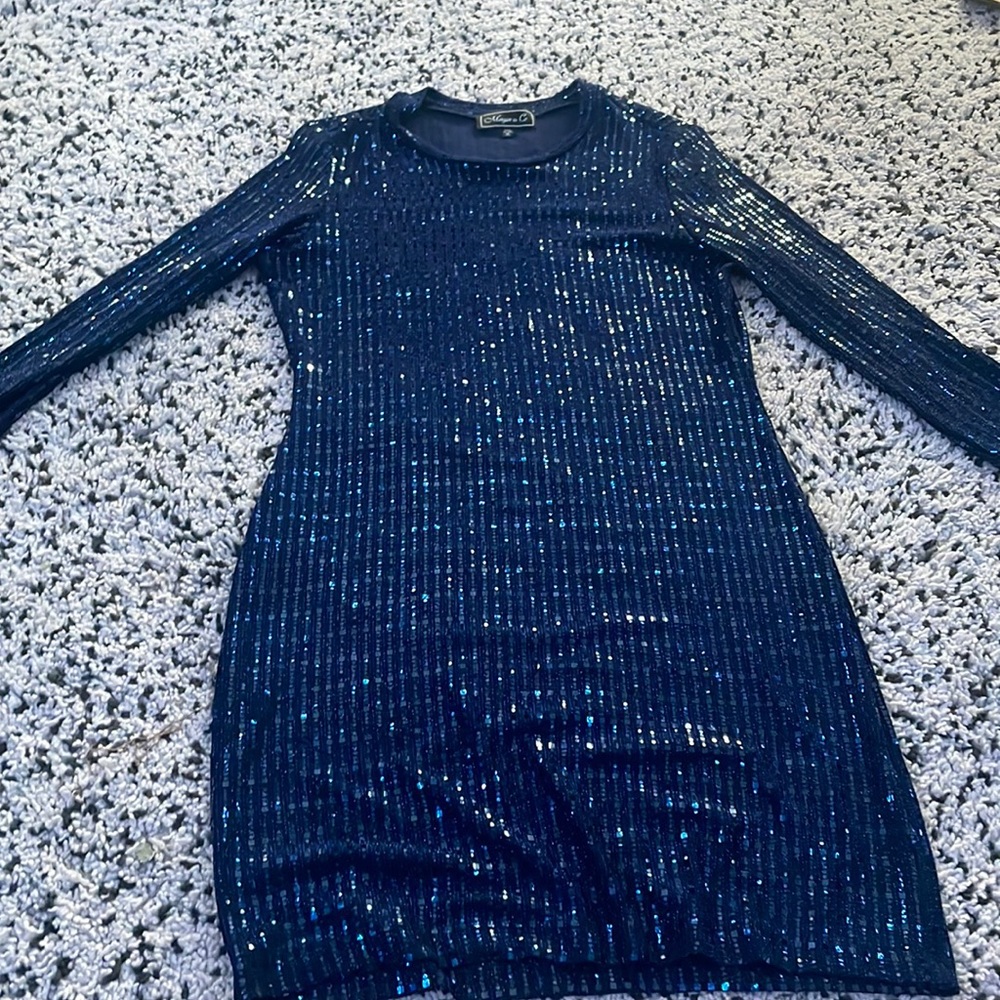 sparkly blue cocktail dress right above the knee